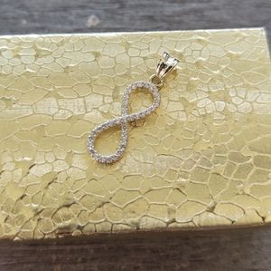 10k yellow gold infinity sign